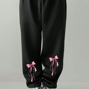 Black Pants with Pink Bow Accents